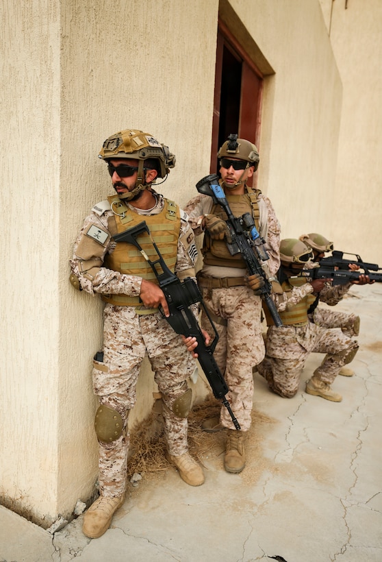 U.S. Marines assigned to Fleet Anti-Terrorism Security Team Central, Command and Saudi marines with the Royal Saudi Naval Forces conduct a squad assault during exercise Indigo Defender 26 at King Faisal Naval Base, Saudi Arabia, Feb. 2, 2026. Indigo Defender 26 is a capstone bilateral maritime exercise between Royal Saudi Naval Forces and U.S. Naval Forces Central Command to enhance interoperability and strengthen our capacity to maintain regional maritime security and stability.  (U.S. Marine Corps photo by Sgt. Angela Wilcox)
