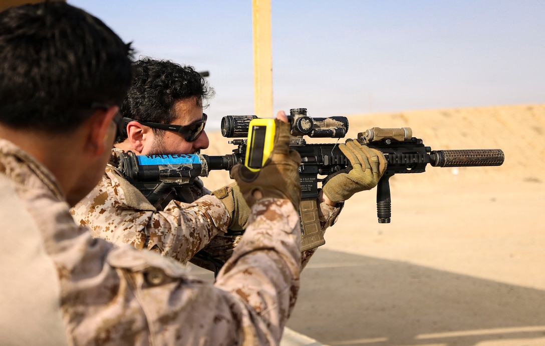 A U.S. Marine assigned to Fleet Anti-Terrorism Security Team Central Command, and a Saudi marine with the Royal Saudi Naval Forces participate in a live-fire range during exercise Indigo Defender 26 at King Faisal Naval Base, Saudi Arabia, Feb. 2, 2026. Indigo Defender 26 is a capstone bilateral maritime exercise between Royal Saudi Naval Forces and U.S. Naval Forces Central Command to enhance interoperability and strengthen our capacity to maintain regional maritime security and stability.  (U.S. Marine Corps photo by Sgt. Angela Wilcox)