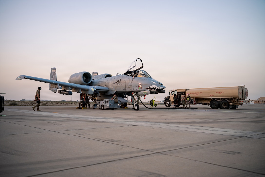 U.S. Airmen assigned to the 75th Mission Generation Force Element perform hot-pit refueling operations at a base in the U.S. Central Command area of responsibility, Feb. 1, 2026. Through integrated combat turns and hot-pit refuels, Airmen sharpened rapid refuel and rearm techniques, reducing time-to-launch while maintaining strict safety standards. (U.S. Air Force photo by Staff Sgt. Tylin Rust)