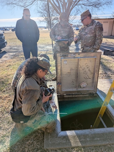 Airmen assess confined space