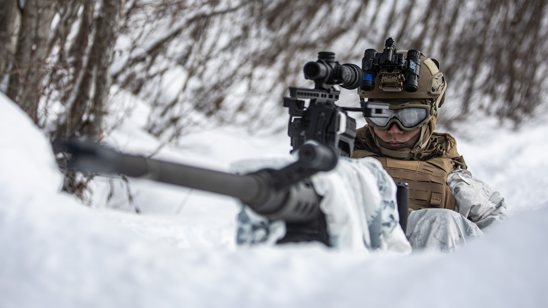 A U.S. Marine with 2d Battalion, 8th Marines, 2d Marine Division holds security with a Browning M2 .50 Caliber Heavy Machine Gun in a defensive position during Exercise Joint Viking 25 in Norway, March 6, 2025. U.S. Marines are in Norway as part of exercise Joint Viking 25, a Norwegian military exercise focusing on arctic cold-weather training and military-to-military engagements. The exercise demonstrates the Marine Corps' unique ability to rapidly deploy during a crisis and aims to enhance interoperability between the U.S. Marine Corps and NATO allies and partners. (U.S. Marine Corps photo by Cpl. Alexander Peterson)