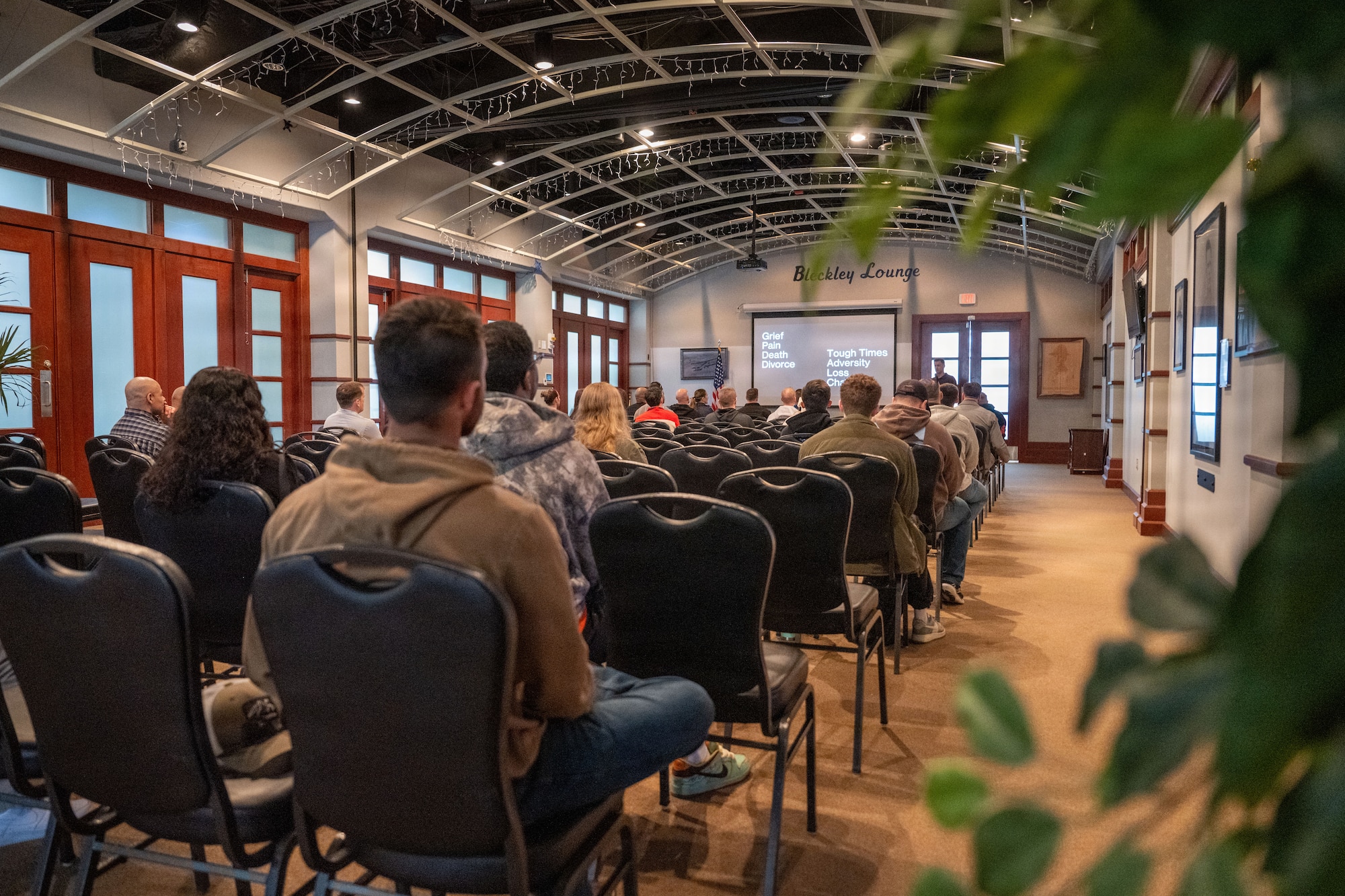 Members of Team McConnell navigate a non-motorized vehicle through a course while wearing impairment simulation goggles during Tanker Talks 2.0 at McConnell Air Force Base, Feb. 9, 2026. The activity was designed to demonstrate how alcohol and THC-related impairment can affect coordination, reaction time and decision-making in a controlled environment. (U.S. Air Force photo by Senior Airman Paula Arce)