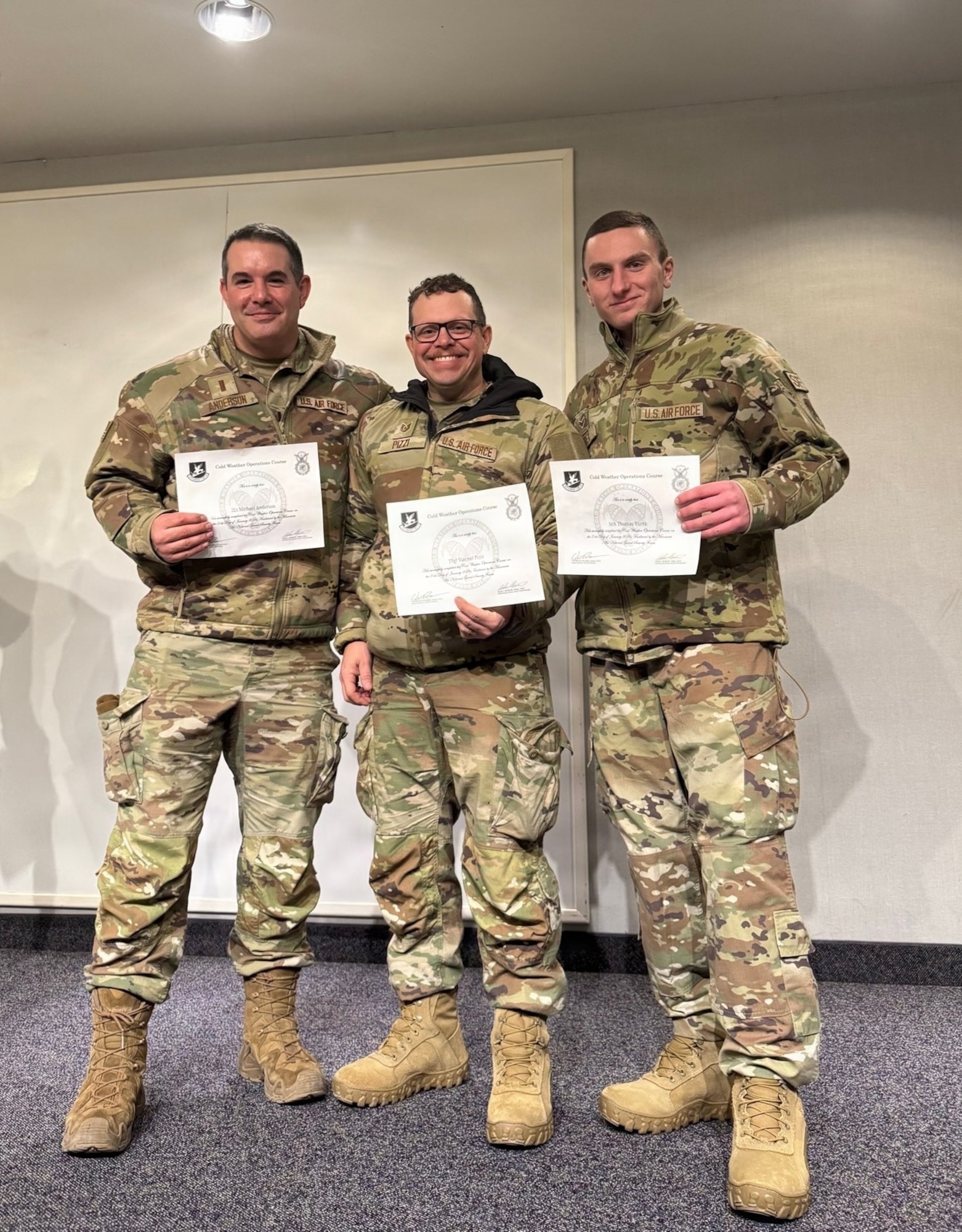 Airmen hold certificates.