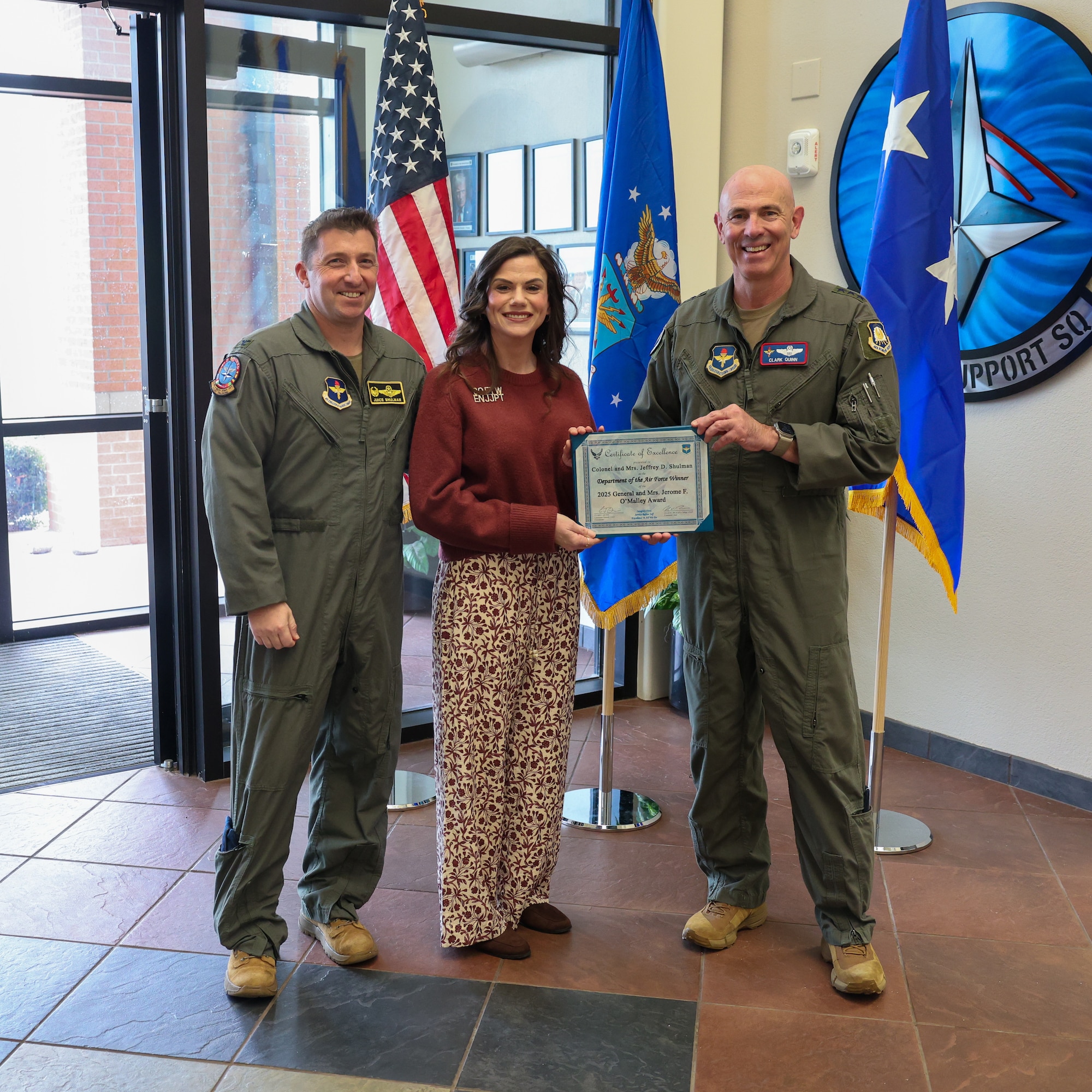 U.S. Air Force Lt. Gen. Clark Quinn, commander of Air Education and Training Command, presents the Air Force O’Malley Award to U.S. Air Force Col. Jeffrey Shulman, commander of the 80th Flying Training Wing, and his wife, Brianne, during a visit to Sheppard Air Force Base, Texas, Feb. 10, 2026.