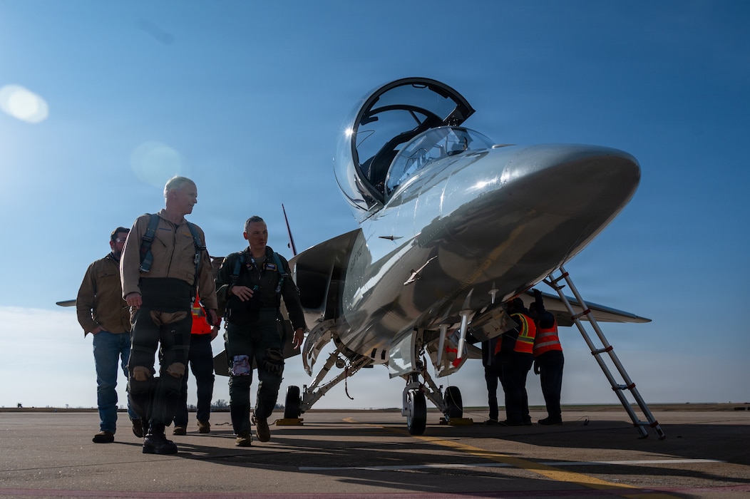 Pilots walk away from a T-7A Red Hawk