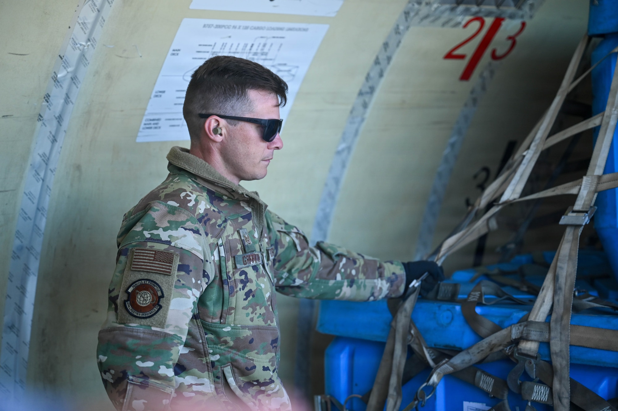 U.S. Air Force Staff Sgt. Joseph Griffith, 45th Logistics Readiness Squadron air terminal operations supervisor, unloads cargo at Patrick Space Force Base, Florida, Jan. 28, 2026. Unloading cargo supports the timely and efficient movement of supplies in support of Ascension Island resupply operations. (U.S. Space Force photo by Staff Sgt. Samuel Becker)