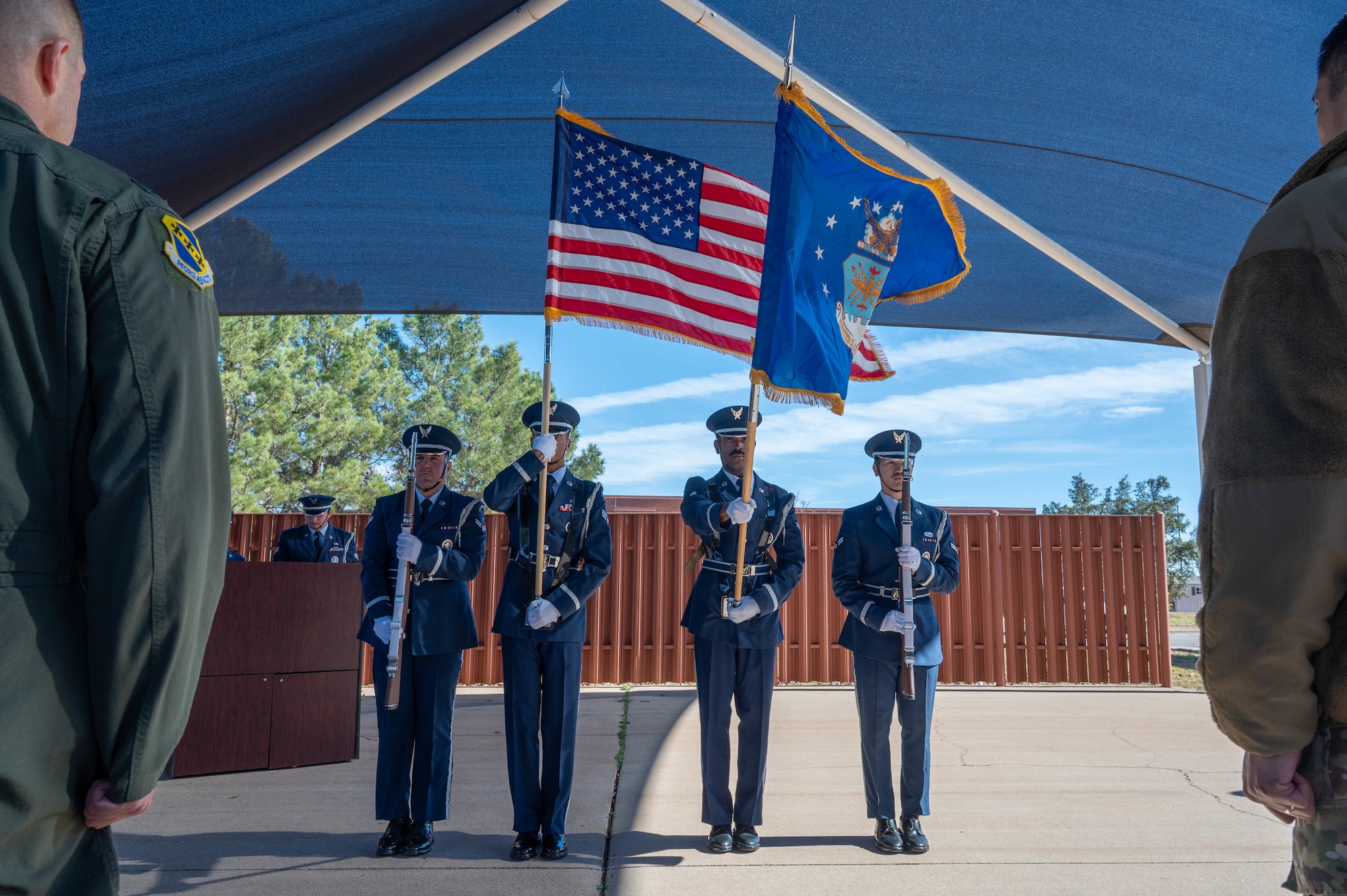 U.S. Air Force ceremonial guardsmen assigned to the 7th Force Support Squadron present the colors during an Honor Guard graduation ceremony at Dyess Air Force Base, Texas, Jan. 16, 2026. The graduation marked the culmination of training in drill, ceremony and military honors, certifying Airmen to represent Dyess and the Air Force as ceremonial guardsmen. (U.S. Air Force photo by Airman William Neal)