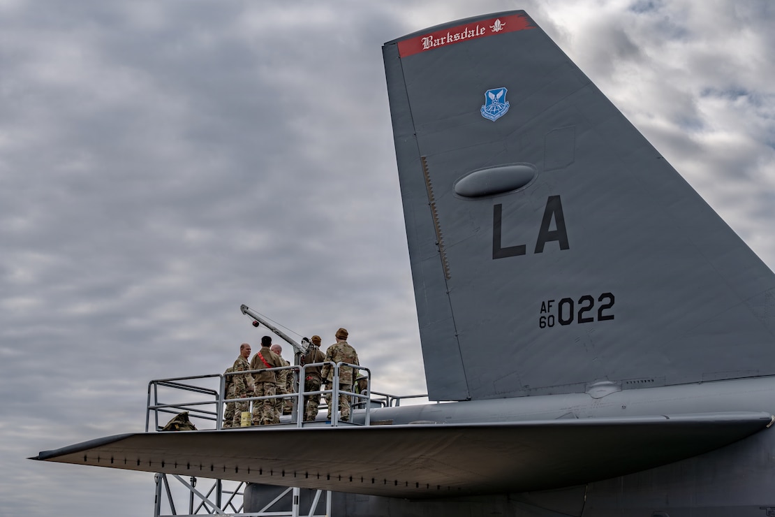 U.S. Air Force Gen. S.L. Davis, commander of Air Force Global Strike Command, meets Airmen from the 96th Bomber Generation Squadron during a maintenance immersion at Barksdale Air Force Base, Louisiana, Dec. 17, 2025. During his immersion with the 2nd Maintenance Group, Davis saw firsthand how the 2nd Bomb Wing ensures the readiness of the worlds largest B-52 fleet. (U.S. Air Force photo by Airman 1st Class Devyn Taylor)