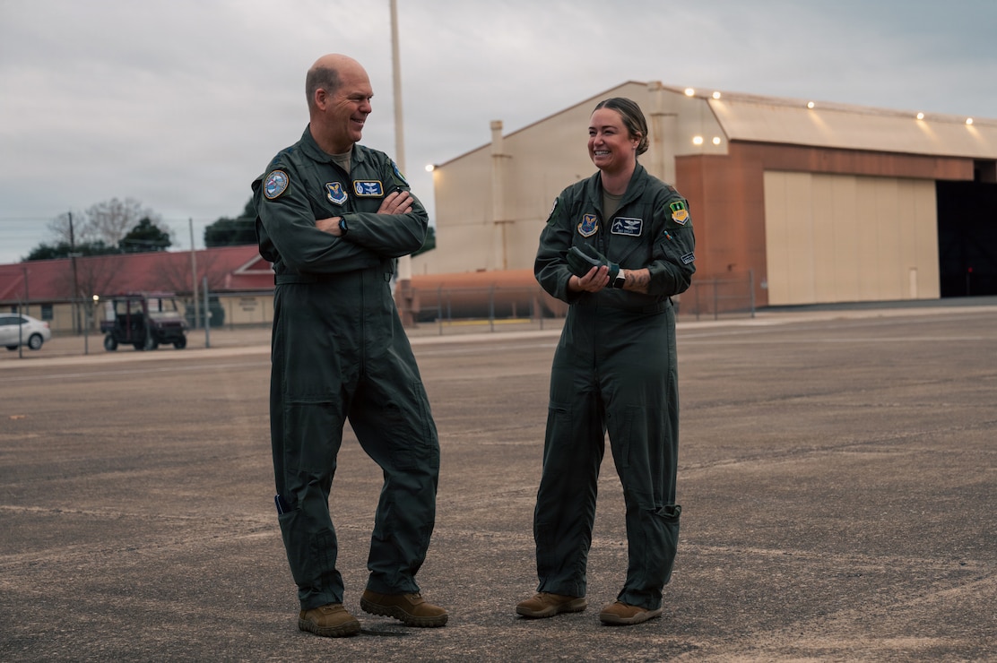 U.S. Air Force Capt. Britian Conley, right, 20th Bomb Squadron pilot, right, discusses some of the preflight checks aircrew carry out prior to flying with Gen. S. L. Davis, commander of Air Force Global Strike Command, at Barksdale Air Force Base, Louisiana, Feb. 3, 2026. Preflight checks are a necessary part of flight operations, they include safety and quality checks prior to takeoff. (U.S. Air Force photo by Senior Airman Seth Watson)