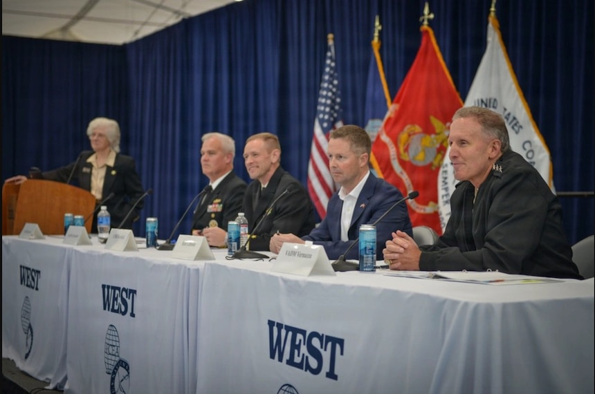 From left to right, Vice Adm. (USN Ret.) Ann Rondeau, Rear Adm. Christopher Alexander, Cmdr. Jens Berdahl, Mr. Rob Lehman and Vice Adm. Mike Vernazza, Commander, Naval Information Forces, address a crowd of industry leaders, servicemembers and media personnel during the Armed Forces Communications & Electronics Association International. The premier naval conference and exposition on the West coast, WEST is now in its 36th year of bringing military and industry leaders together. Co-sponsored by AFCEA International and the U.S. Naval Institute, WEST is the only event in which the makers of platforms and the designers of technologies can network, discuss and demonstrate their solutions in a single locale. (U.S. Navy photo by Mass Communication Specialist 2nd Class Ray McCann/RELEASED)