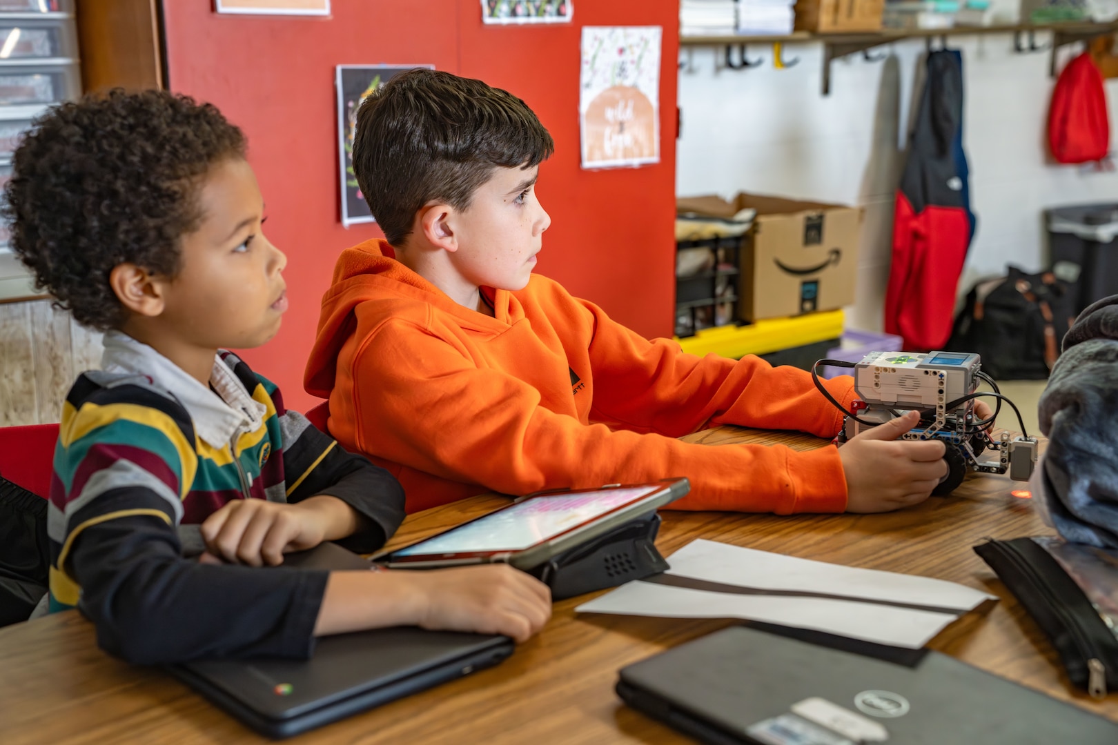 WARSAW, Va.  – Students in Kaylin Drake’s fourth grade science class at Richmond County Elementary School learn how to program robots donated by Naval Surface Warfare Center Dahlgren Division. The robots have been used to develop a Naval Sea Command-themed robotics camp and curriculum using the NSWCDD-donated Lego kits as a foundation. Dahlgren Division scientists and engineers serve as STEM advocates across area schools, reaching thousands of students each year to develop tomorrow’s Navy innovators. (Dorina Watermolen/NSWCDD Photo)