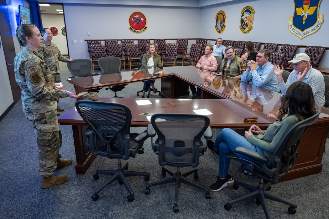 U.S. Air Force Col. Amanda Knotts, 97th Mission Support Group commander, and Chief Master Sgt. Mark Erwin, 97th Mission Support Group senior enlisted leader, brief honorary commanders during a Mission Support Group tour at Altus Air Force Base, Oklahoma, Feb. 6, 2026. The tour familiarized honorary commanders with the group’s mission and support capabilities while strengthening relationships between the installation and the local community. (U.S. Air Force photo by Airman 1st Class Nathan Langston)