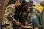 Spc. Emmett Jones (left) and Spc. Layton Richmond (right) from the 1245th Transportation Company, 345th Combat Sustainment Support Battalion, 90th Troop Command, Oklahoma Army National Guard diagnoses an issue on a Light Medium Tactical Vehicle during the OKARNG’s 2026 Best Mechanic competition at the Combined Support Maintenance Shop in Norman, Oklahoma, Feb. 7, 2026. Guardsmen from across the state took part in a series of stations designed to test their skills in diagnostics, technical proficiency, including electrical circuits, measuring and inspection, and the use of the Army’s maintenance management system. (Oklahoma National Guard photo by Sgt. Haden Tolbert)