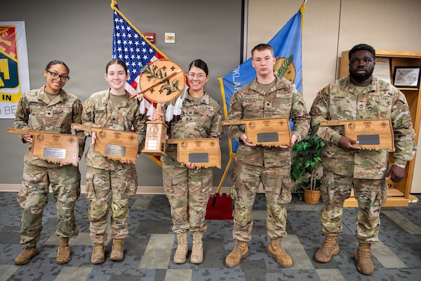 (left to right) Spc. Jasman Lover-Said, Spc. Lindi Corless, Sgt. Juliana Martinez, Spc. Brayden Buffalohead and Sgt. 1st Class Emmanuel Okonkwo, all members of the 903rd Quartermaster Company, pose with their individual and team trophy after winning the third annual Oklahoma Army National Guard Culinary Excellence Competition, in Norman, Oklahoma, Feb. 8, 2026. This win for the 903rd marks the third time in a row a team representing the 903rd has placed first in the competition designed to recognize outstanding OKARNG cooks. (Oklahoma National Guard photo by Staff Sgt. Anthony Jones)