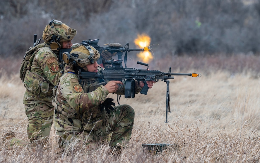 U.S. Air Force Senior Airman Antwan Lunarde (left), and U.S. Air Force Senior Airman David Gomez, 91st Missile Security Operations Squadron convoy team members, engage simulated opposing forces during a force-on-force exercise in Garrison, North Dakota, Feb. 6, 2026. The exercise tested Lunarde, Gomez, and their team’s ability to detect and defeat adversary threats in a contested environment. (U.S. Air Force photo by Senior Airman Kyle Wilson)
