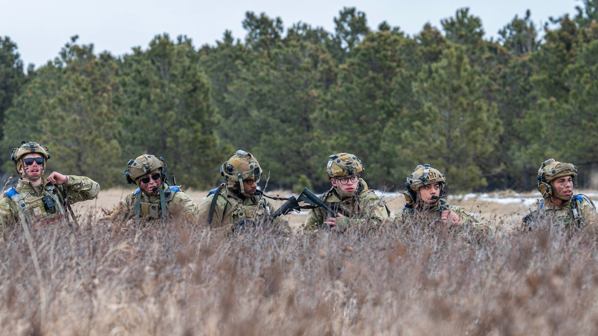 U.S. Airmen assigned to the 91st Missile Security Operations Squadron monitor their surroundings during a force-on-force exercise in Garrison, North Dakota, Feb. 6, 2026. The exercise validated the Airmen’s ability to detect and defeat adversary threats in a contested environment. (U.S. Air Force photo by Senior Airman Kyle Wilson)