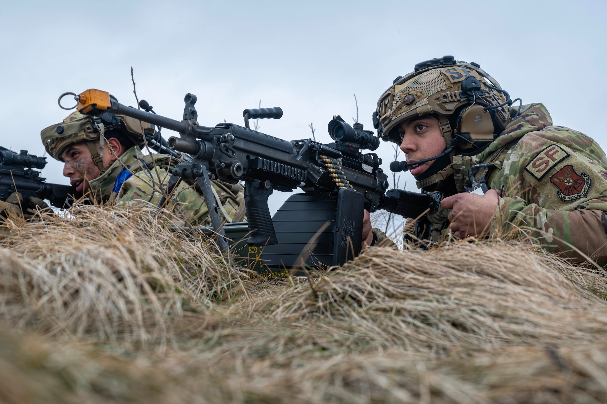 U.S. Air Force Senior Airman Antwan Lunarde (left), and U.S. Air Force Senior Airman David Gomez, 91st Missile Security Operations Squadron convoy team members, provide overwatch security to their team during a force-on-force exercise in Garrison, North Dakota, Feb. 6, 2026. As part of the exercise, Lunarde and Gomez worked with their team to properly identify and neutralize a simulated opposing force. (U.S. Air Force photo by Senior Airman Kyle Wilson)