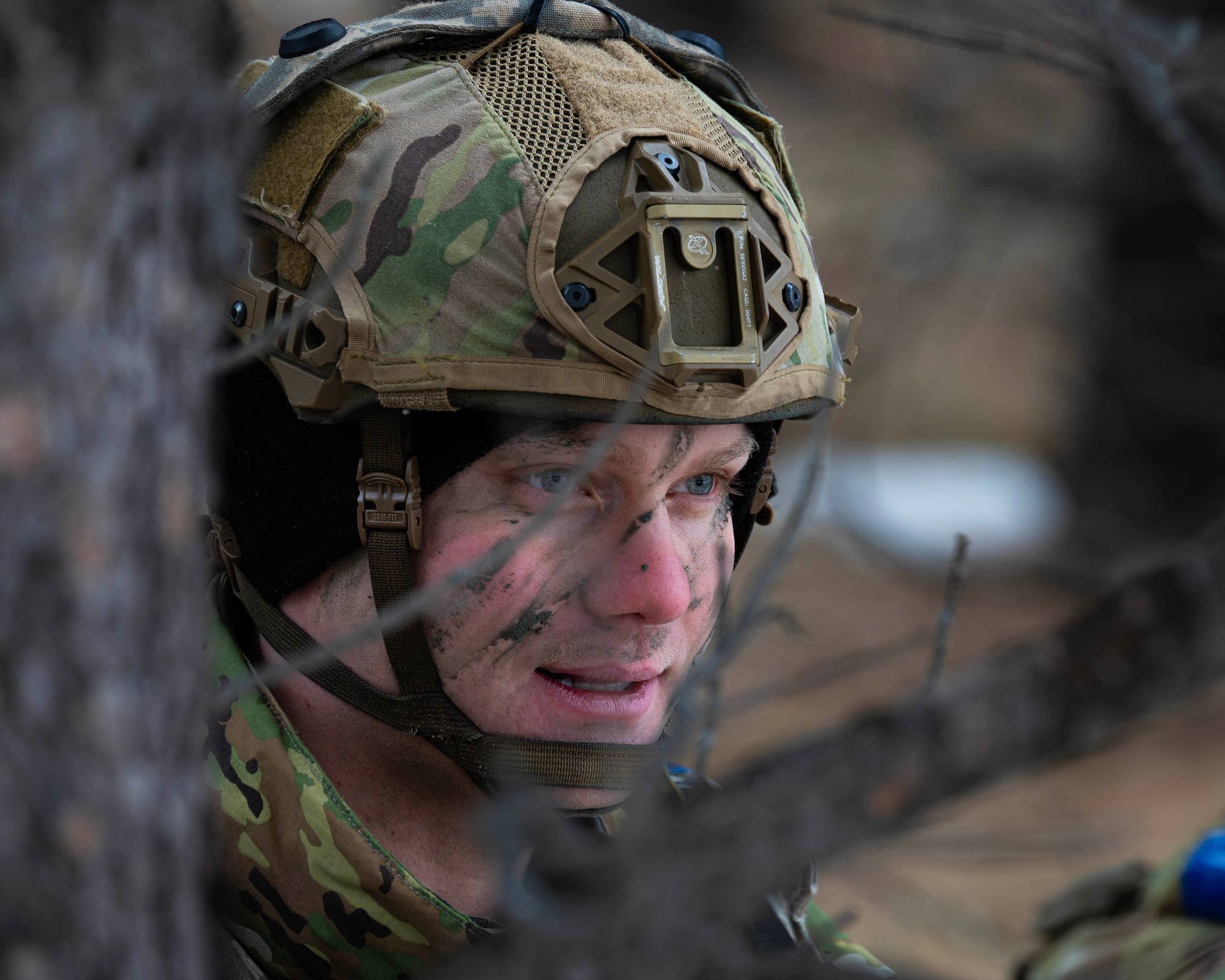 U.S. Air Force 1st Lt. Cole Lautt, 91st Missile Security Operations Squadron convoy response force flight commander, monitors his surroundings during a force-on-force exercise in Garrison, North Dakota, Feb. 6, 2026. Lautt and his team identified and engaged simulated opposing forces as part of the exercise. (U.S. Air Force photo by Senior Airman Kyle Wilson)