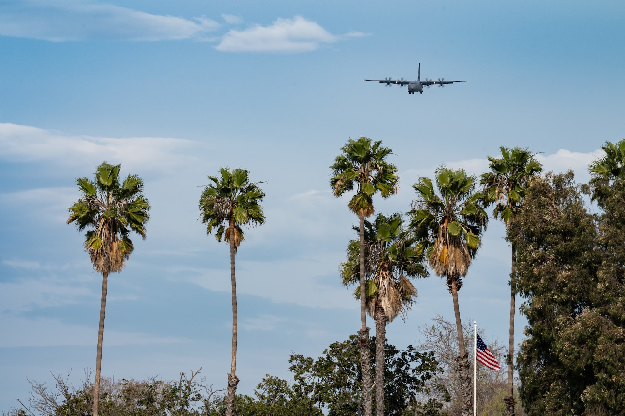A U.S. Air Force C-130J Super Hercules assigned to the 39th Airlift Squadron approaches Marine Corps Base Camp Pendleton, California, Feb. 5, 2026. During the Spring 2026 C-130 Weapon System Council, the aircraft diverted to assist a grounded C-130J, enabling maintenance Airmen to identify, repair and return the aircraft to flight status before redeploying to Dyess Air Force Base, Texas. (U.S. Air Force photo by Senior Airman Jade M. Caldwell)