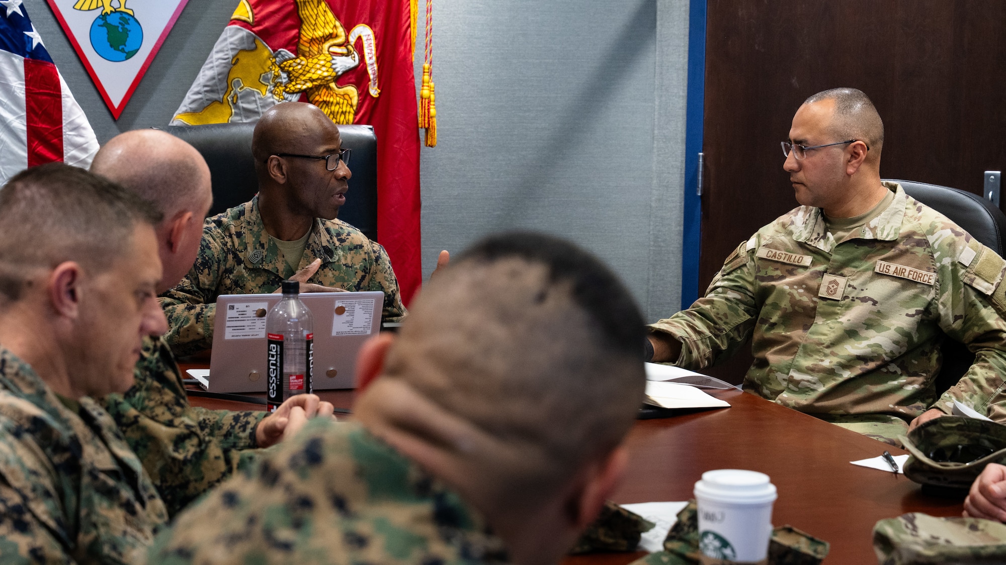 U.S. Marine Corps Sgt. Maj. Idris Turay, Marine Aircraft Group 39 sergeant major , speaks with U.S. Air Force Chief Master Sgt. Martin Castillo, 317th Airlift Wing command chief, during a senior enlisted leader sync at the Spring 2026 C-130 Weapon System Council at Marine Corps Base Camp Pendleton, California, Feb. 5, 2026. The senior enlisted leaders discussed enlisted development, challenges faced by both branches and opportunities for future joint integration. (U.S. Air Force photo by Senior Airman Jade M. Caldwell)