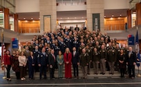 VNG Soldiers, Airmen and alumni pose for a group photo with Gov. Spanberger, Lt. Gov. Hashmi, and Sec. Williams
