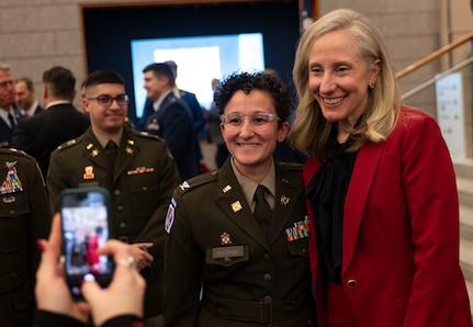 Gov. Spanberger poses for a photo with Col. Alyssa Astphan at the legislative reception.