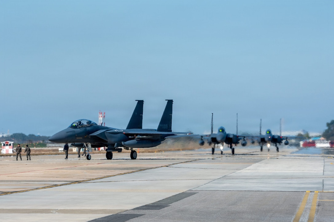 Republic of Korea Air Force F-15K Slam Eagles taxi to parking after arriving at Kunsan Air Base, ROK, Nov. 3, 2025, during Freedom Flag 25-2. FF 25-2 is a routine, regularly scheduled training event designed to prepare joint and combined forces for combat to defend the Republic of Korea.