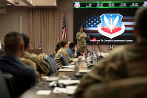 Chief Master Sgt. Leah Anderson, executive for enlisted matters to the Assistant Secretary of the Air Force for Financial Management and Comptroller, speaks during the 2026 Air Combat Command Comptroller and Senior Enlisted Leader Summit at Joint Base Langley-Eustis, Virginia, Jan. 27, 2026. Anderson’s speech centered around training Airmen for the evolving needs of the Air Force and preparing for deployments. (U.S. Air Force photo by Tech. Sgt. Joshua Edwards)