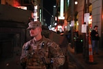 A Louisiana National Guard Soldier conducts a presence patrol in the New Orleans French Quarter in support of Task Force Defender, Dec. 30, 2025. Soldiers from the 61st Troop Command, headquartered in Carville, and the 256th Infantry Brigade Combat Team, headquartered in Lafayette, assisted local and state law enforcement during New Year’s Eve celebrations and the 92nd annual Sugar Bowl, Dec. 29, 2025, to Jan. 1, 2026. Photo by Sgt. Danny Hough.