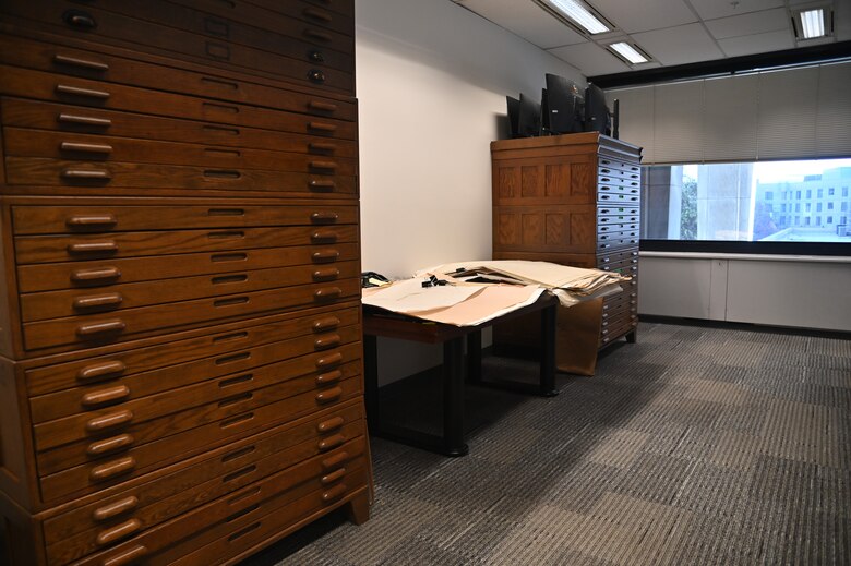 Modern cartographers for the United States Army Corps of Engineers’ Fort Worth District Real Estate Division have decades of maps stored in wooden cabinets. The maps show the different phases of projects including the district’s 25 lakes, military construction, as well as flood risk mitigation projects with local, county and state governments from throughout the district’s boundaries. Using the old two-dimensional maps along with current surveys allows the cartographers to produce new maps using modern software such as MicroStation and ArcGIS Pro that clearly depicts each and every project in a clearer, multi-dimensional view that was not available before.