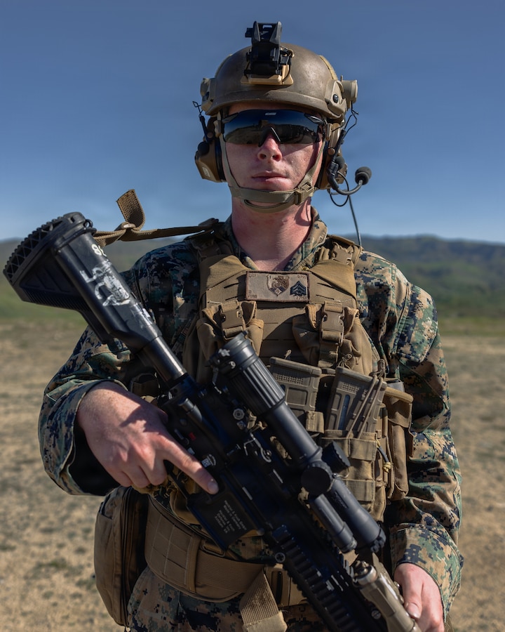 U.S. Marine Corps Sgt. Timothy Flynn, a mortarman with Charlie Company, 1st Battalion, 25th Marine Regiment, 4th Marine Division, poses for a photo during Intermediate location (ILOC) live fire training at Marine Corps Base Camp Pendleton, California, Feb. 5, 2026. The event took place as part of an ILOC pre-deployment training which enables unit mobilization to specific areas of operations before potential future deployments, increasing combat readiness and lethality. (U.S. Marine Corps photo by Sgt. Edgar Rafael)