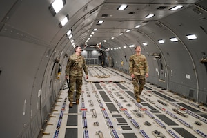 A Crew Chief inspect KC-46A Pegasus aircraft