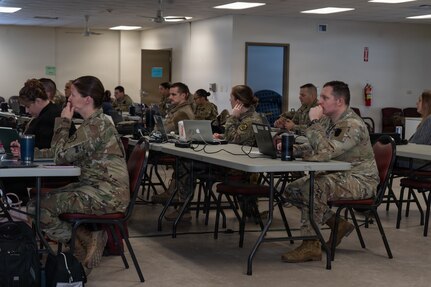 Pennsylvania National Guard Soldiers participate in an Artificial Intelligence 201 class at Fort Indiantown Gap, Pennsylvania, Feb. 11-12, 2026. The course, taught by U.S. Army War College faculty, focused on responsible AI use and practicing critical thinking skills for effective AI prompting. (U.S. Army National Guard photo by Sgt. Kayden Bedwell)