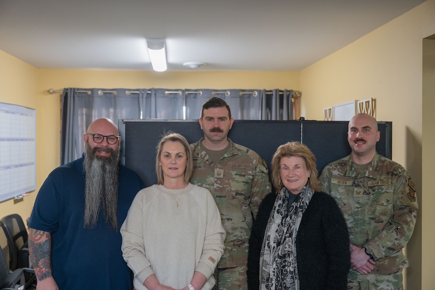 Members of the Minot Air Force Base Prevention Team pose for a group photo at Minot Air Force Base, North Dakota, Feb. 11, 2026. The team organized and executed the first Buddy Check Challenge promoting purposeful presence and encouraging Airmen to intentionally check in with each other.