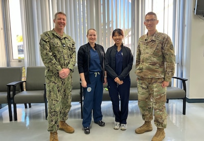 Strengthening partnerships for better health, (from left) U.S. Navy Cmdr. Brian Taylor , U.S. Naval Hospital Yokosuka (USNH Yokosuka) pediatrician and acting director for medical services; U.S. Navy Cmdr. Konstance Mackie, USNH Yokosuka pediatric nurse; U.S. Navy Lt. Laila Kong, USHN Yokosuka pediatric nurse; and U.S. Army Col. (Dr.) Charlie T. Nguyen, TAMC pediatric and cardiologist, collaborated with the TAMC Pediatric Cardiology team during a clinic at USNH Yokosuka on Dec. 8-12. Together, they provided essential cardiology services to children in need, underscoring their commitment to specialized care and the health of military families.
