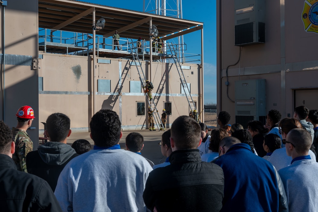 Airmen assigned to the 312th Training Squadron conduct ladder and elevated rescue training during a Louis F. Garland Fire Academy demonstration for Lake View High School Junior Reserve Officers’ Training Corps cadets at Goodfellow Air Force Base, Texas, Feb. 4, 2026. The experience highlighted the role Goodfellow plays in preparing mission-ready service members. (U.S. Air Force photo by Senior Airman James Salellas)