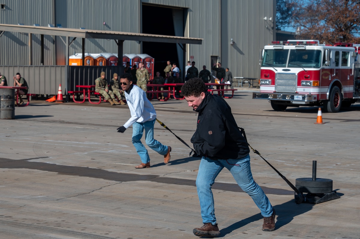 Lake View High School Junior Reserve Officers’ Training Corps cadets participate in a physical training activity during a visit to Goodfellow Air Force Base, Texas, Feb. 4, 2026. The visit allowed cadets to observe Air Force training environments and routines. (U.S. Air Force photo by Senior Airman James Salellas)