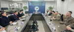 Major General Drew sits down with officials from South Korea's Arms Control and Verification Agency (KAVA).
