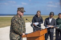 U.S. Marine Corps Maj. Erich Lamm, director of the Regional Contracting Office, Marine Corps Installations Pacific, answers questions from local news reporters after a ribbon cutting ceremony at Ie Shima Training Facility, Okinawa, Japan, Dec. 15, 2025.