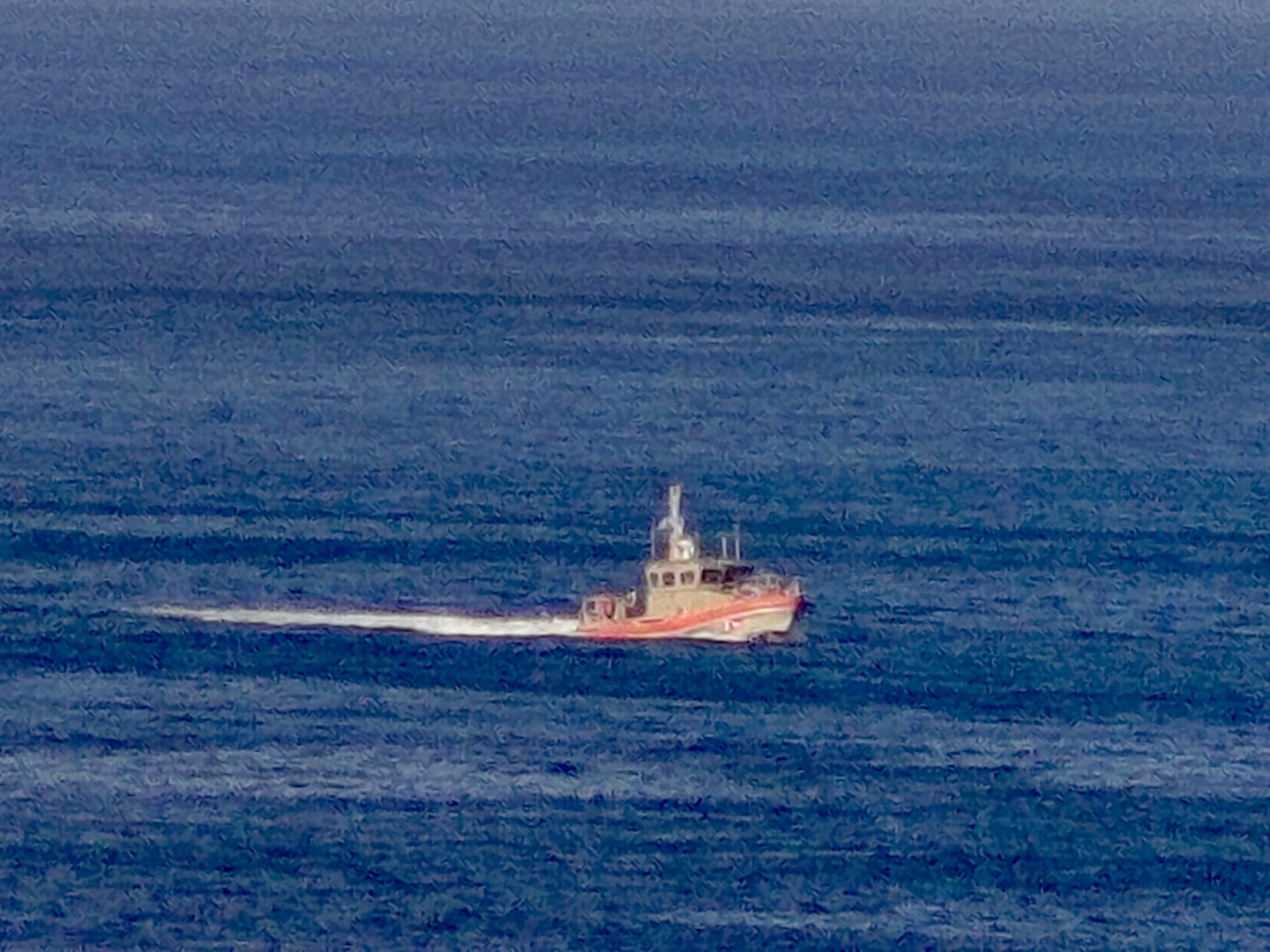 A U.S. Coast Guard Station Apra Harbor 45-foot Response Boat-Medium crew searches for a missing swimmer off Guam's west side on Feb. 19, 2026. The U.S. Coast Guard suspended the active search Friday at sunset for a 22-year-old man who was swept beyond the reef line while swimming at Tanguisson Beach on Tuesday evening. He remains missing. U.S. Coast Guard, U.S. Navy, and Guam National Guard crews conducted 26 search patterns over three days, covering 637 square nautical miles, in addition to substantial efforts by Guam Fire Rescue crews. (U.S. Coast Guard photo by Petty Officer 2nd Class Jackson Collins)