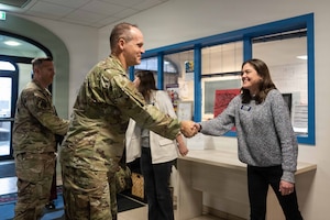 U.S. Air Force Maj. Gen. Jefferson O’Donnell shakes hand.