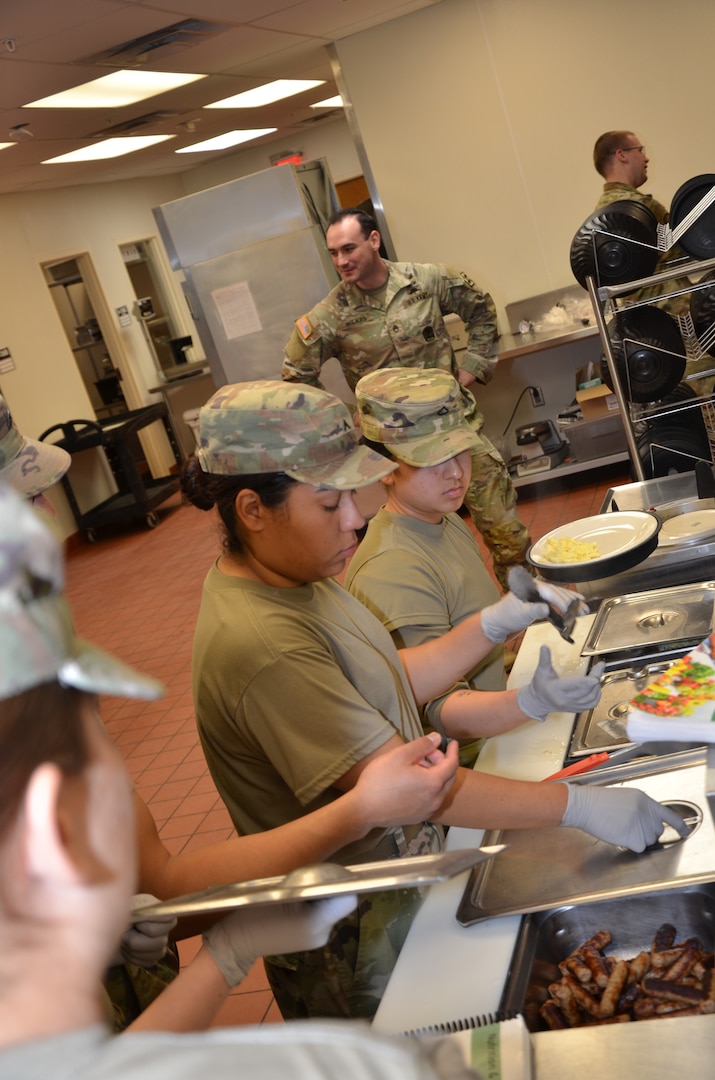 During the Patient Tray Services block of instruction in the Medical Education and Training Campus Nutrition & Diet Therapy course, trainees apply classroom knowledge in a hands-on kitchen laboratory environment that mirrors real-world clinical food service operations. This training reinforces the critical role Army and Air Force nutrition care specialists play in patient care and recovery within fixed medical facilities.