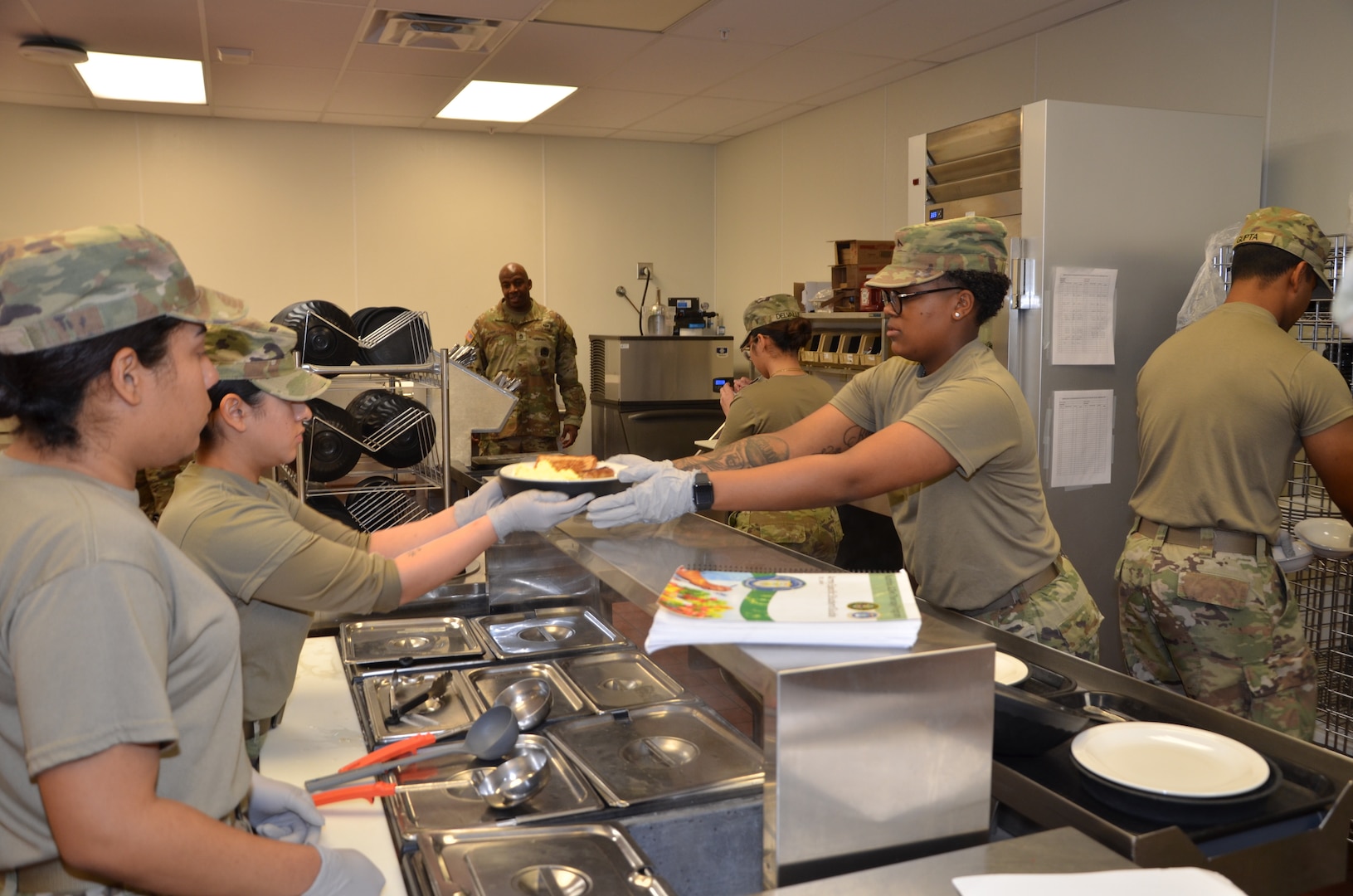 During the Patient Tray Services block of instruction in the Medical Education and Training Campus Nutrition & Diet Therapy course, trainees apply classroom knowledge in a hands-on kitchen laboratory environment that mirrors real-world clinical food service operations. This training reinforces the critical role Army and Air Force nutrition care specialists play in patient care and recovery within fixed medical facilities.