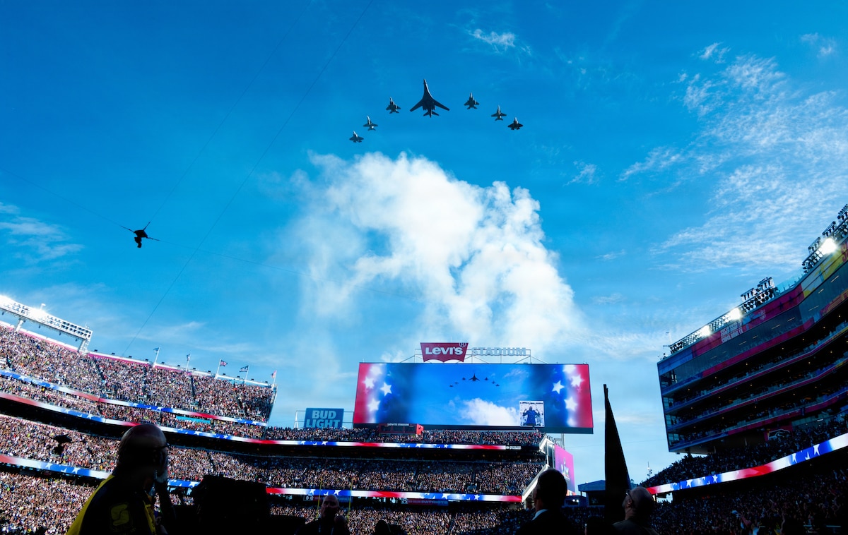 A joint formation of U.S. Air Force and Navy aircraft flies over Super Bowl LX in Santa Clara, Calif., Feb. 8, 2026. The flyover, which included Air Force B-1B Lancers and F-15C Eagles alongside Navy F-35C Lightning IIs and F/A-18 Super Hornets, commemorated America’s 250th anniversary. (U.S. Air National Guard photo by Tech. Sgt. Shelby Thurman)