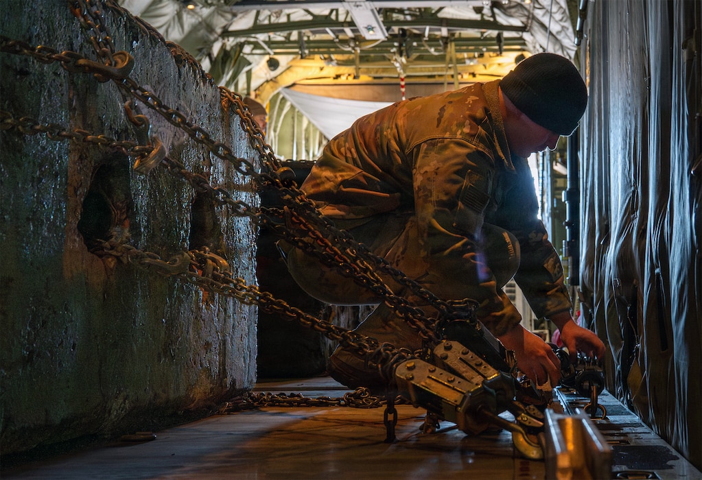 Airman securing load