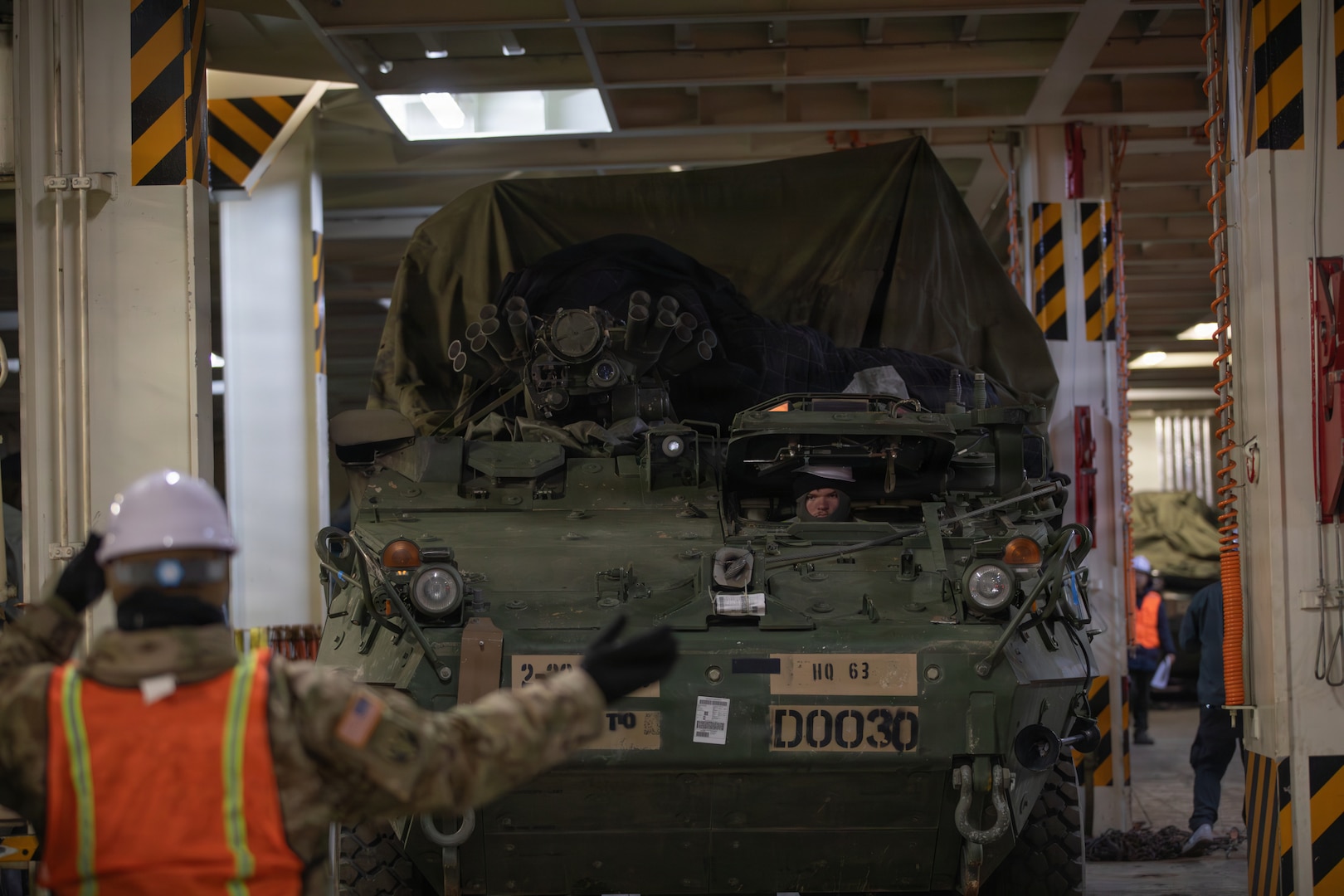 U.S. Soldiers assigned to 837th Transportation Battalion offload containers and upload vehicles and equipment at the Busan, South Korea, port Feb. 1, 2026. With the help of U.S. Army Transportation, U.S. Transportation Command conducts Operation Turbo Fusion, which demonstrates how the military integrates multiple modes of transportation to move cargo around the globe, even in contested environments. 2nd Stryker Brigade Combat Team, 2nd Infantry Division, equipment and containers were offloaded while vehicles from 1st Stryker Brigade Combat Team, 4th Infantry Division, were loaded onto the ship. 2SBCT falls under the 2nd Infantry Division contingent at Joint Base Lewis-McChord, Washington, and is replacing 1SBCT, 4ID, as the new U.S. Army Korea Rotational Force that will train with the Republic of Korea Army in support of the ROK-US alliance and contribute to readiness in the Indo-Pacific region.