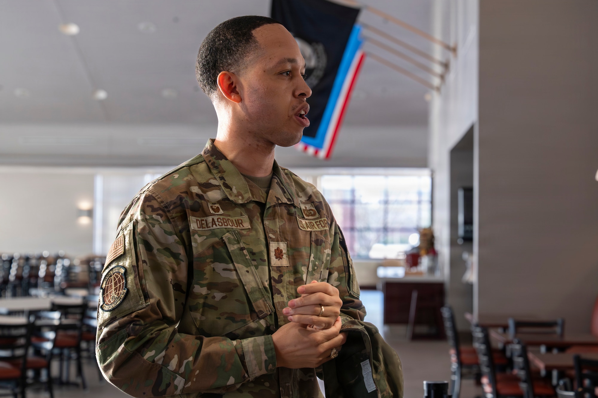 Maj. Nick Delasbour, 319th Force Support Squadron commander, talks about the significance of the Airey Dining Facility renovation during a ribbon cutting ceremony at Grand Forks Air Force Base, North Dakota, Feb. 9, 2026.