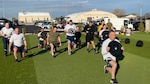 Maj. Gen. Lyle K. Drew, Acting Director of the Defense Threat Reduction Agency (DTRA), and Sgt. Maj. Daniel Mangrum, DTRA Senior Enlisted Leader participate in physical training (PT) session with military personnel from DTRA-West.