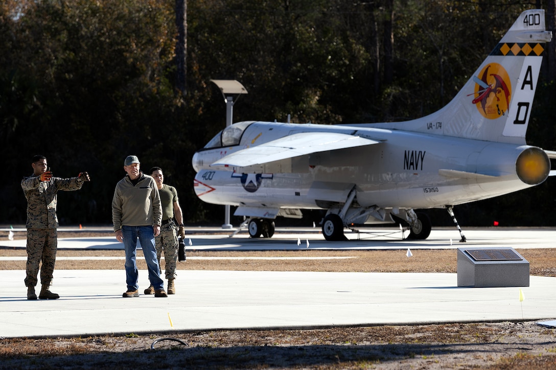 U.S. Marine Corps Gunnery Sgt. Hector Perez, expeditionary airfield chief, discusses placement of aluminum expeditionary airfield matting with retired Navy Capt. Ed Turner, executive director of the National POW/MIA Memorial and Museum, Feb. 12, 2026, at the National POW/MIA Memorial and Museum site in Jacksonville, Florida. The matting, which was drawn from prepositioning sets at Marine Corps Support Facility Blount Island, supported the movement of a restored S-3 Viking aircraft onto the memorial’s developing Legacy Plaza at Cecil Field. (Official U.S. Marine Corps photo by Dustin Senger)
