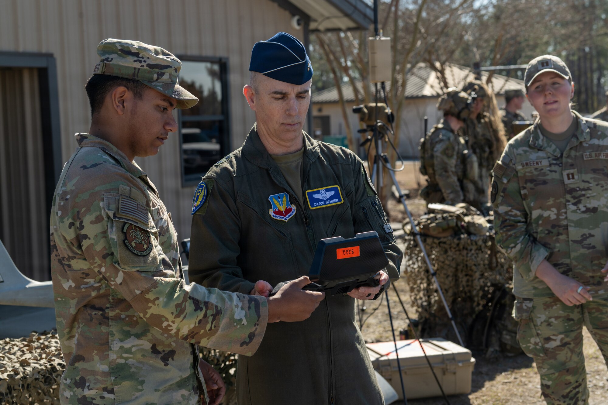 Man holding controller for a drone.